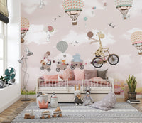 Pink Hot Air Balloon Animals Bicycle Wall Mural in a room with a grey rug and toys.