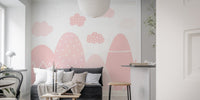 Misty mountain range mural in soft pink tones for living room.
