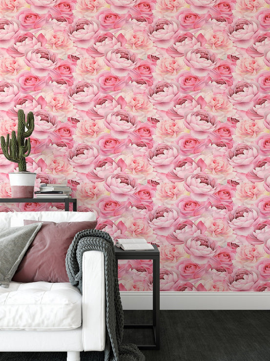 Pink peonies roses wallpaper for living room wall decor with white sofa and side table.