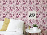 Pink Peony Flowers Summer Wallpaper in a bedroom with white bedding and yellow cushion.