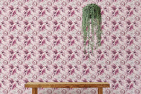 Pink Peony Flowers Summer Wallpaper with a hanging green plant decoration.