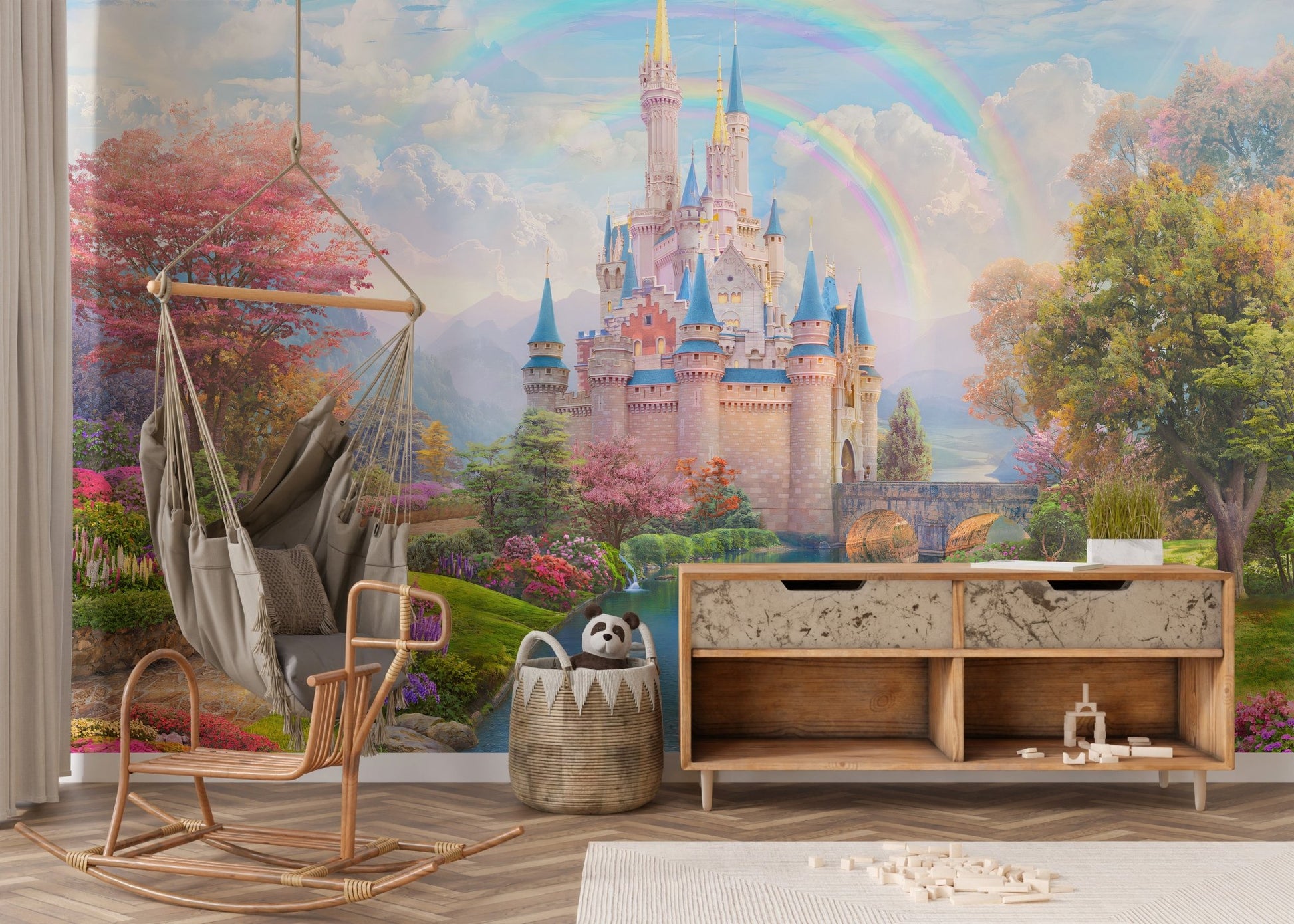Custom castle wall mural with a swing chair and wooden storage unit in nursery.