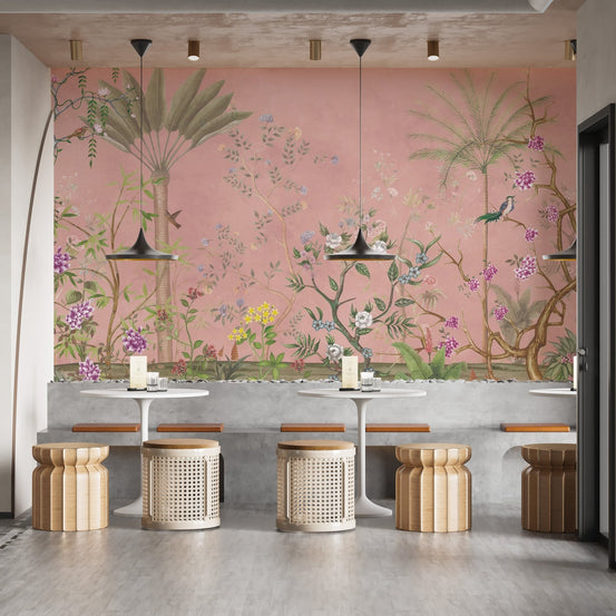 Pink tropical chinoiserie wallpaper with purple flowers and birds.