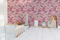 Kitchen space accented with artistic watercolor floral wallpaper.