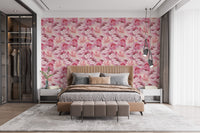 Bright bedroom with pink watercolor rose wallpaper.