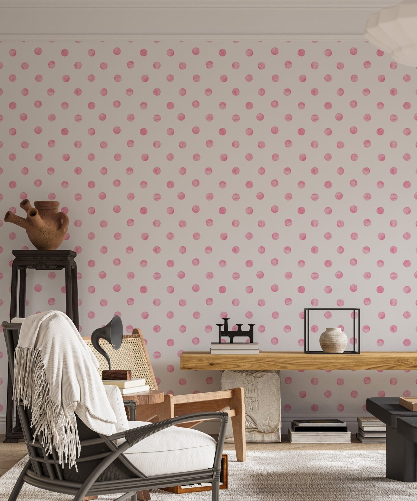 Home office wallpaper with pink watercolor dots behind a desk and leather chair.