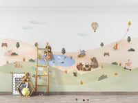 Kids garden animals wallpaper wall mural with hot air balloon and pond.