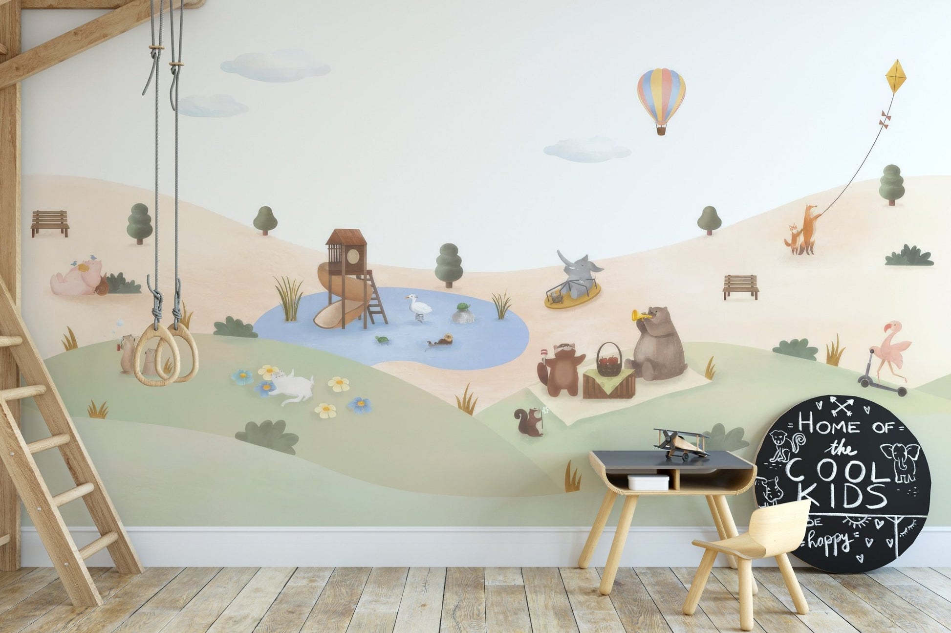 Playful animals garden wall mural wallpaper with pastel hills and pond.