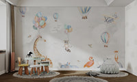 Hot air balloons and vintage airplane flying in cloudy sky wall mural.