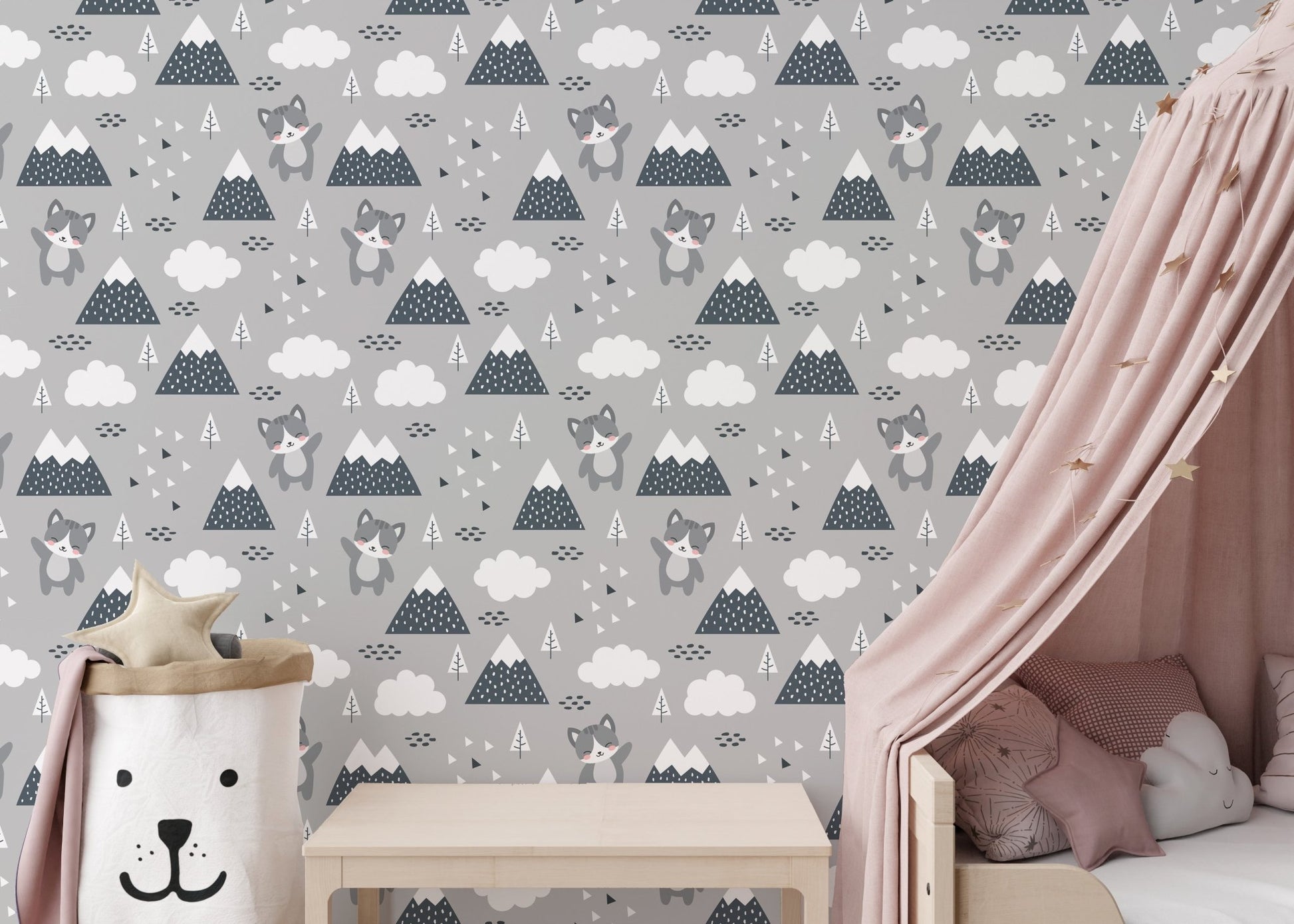 Grey kitty patterned wallpaper in a bedroom with a pink canopy bed