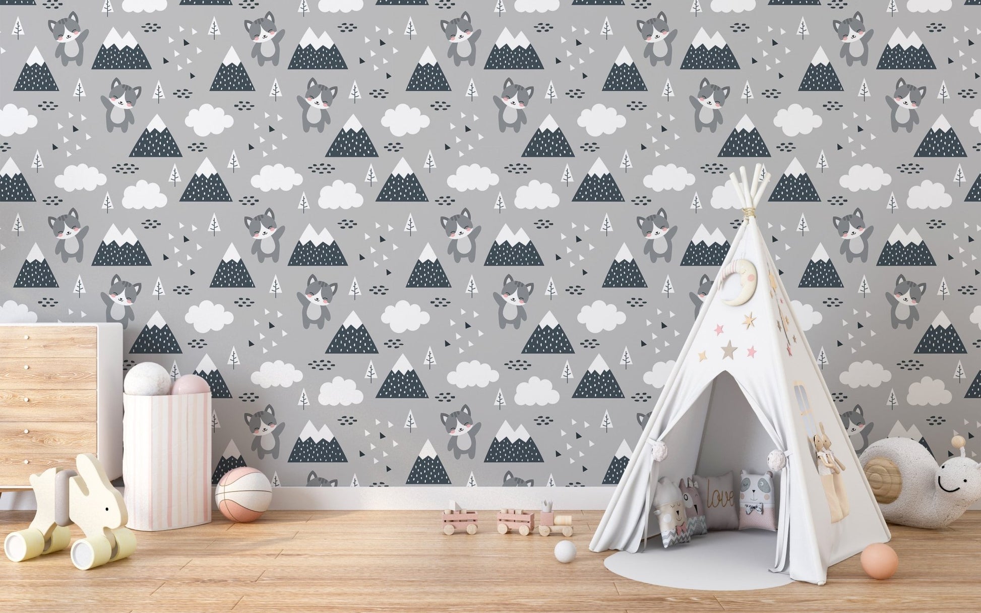 Kitty themed wallpaper in a child's room with a white teepee tent