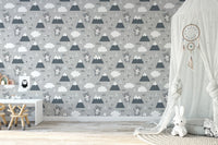 Scandinavian wallpaper with grey mountains and cats for a toddler room
