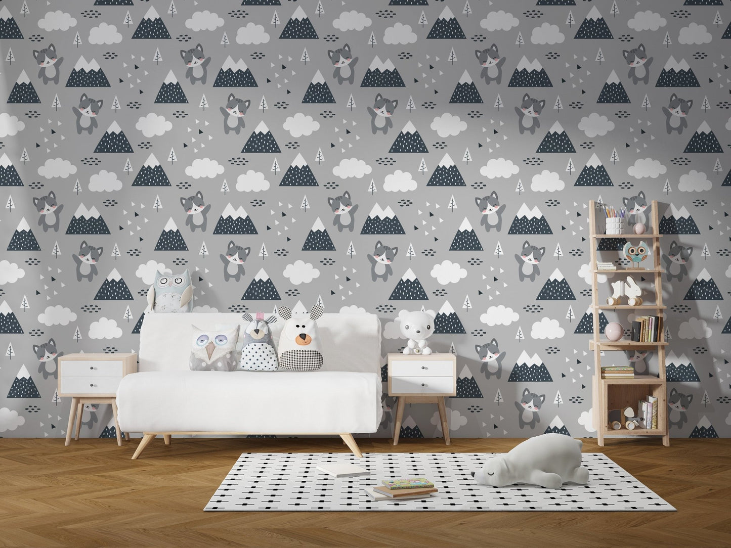 Grey wallpaper with mountain and cat patterns in a nursery setting