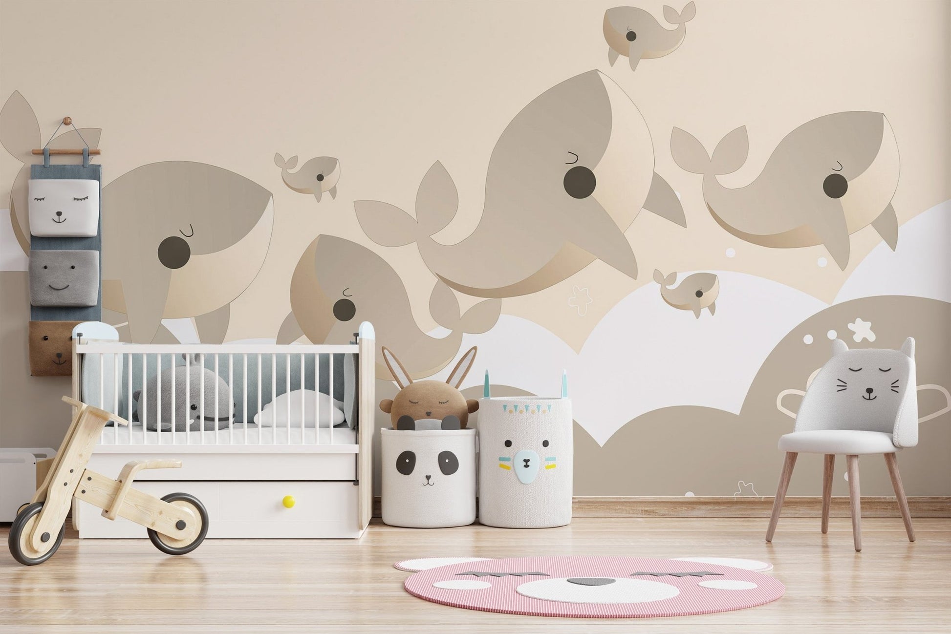 Playful whales nursery wall mural in soft beige tones for kids.