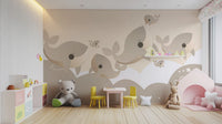 Cute baby whale wall mural designed for a serene nursery space.
