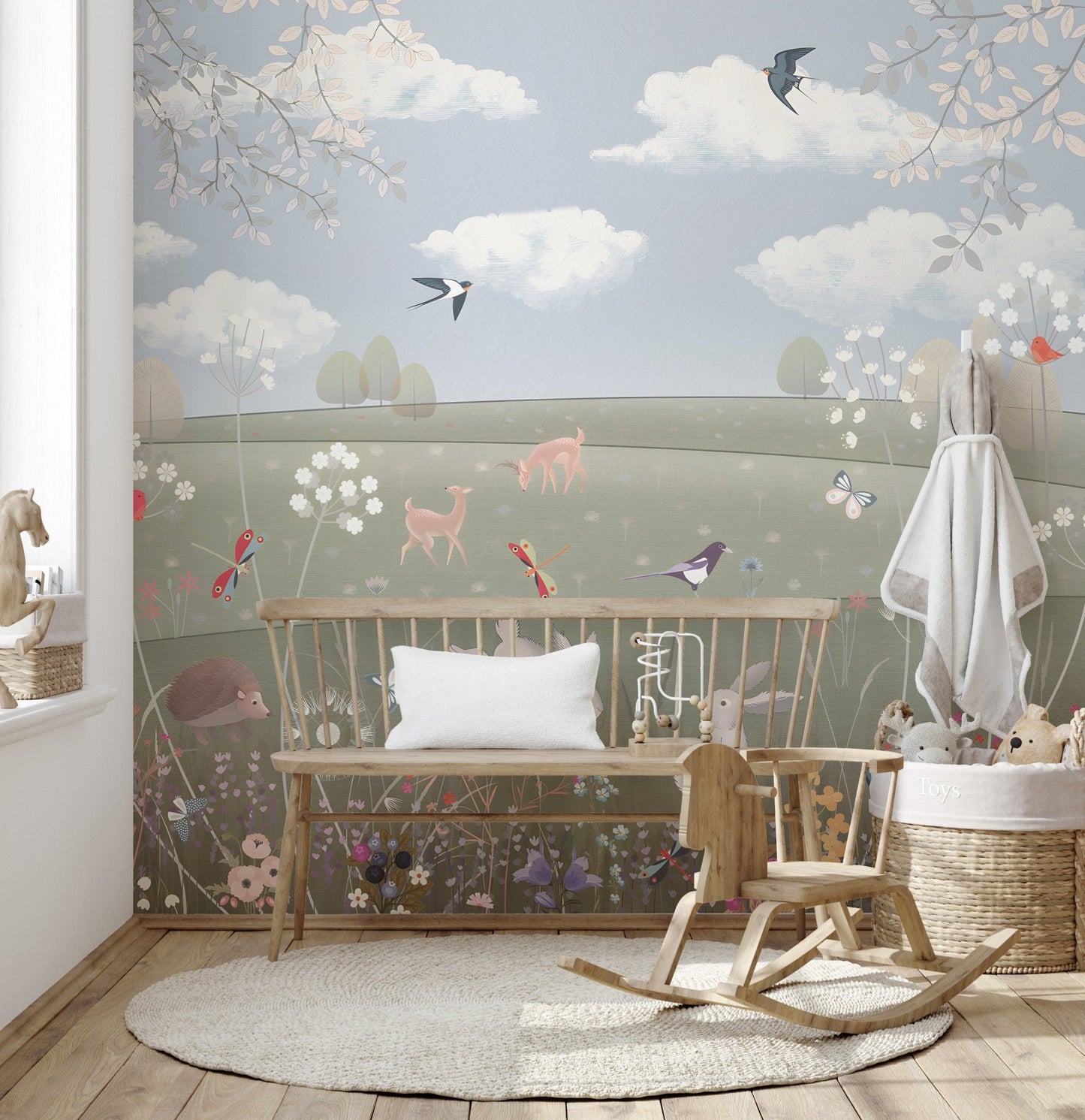 Storybook style wildlife wall mural with rabbits and birds.