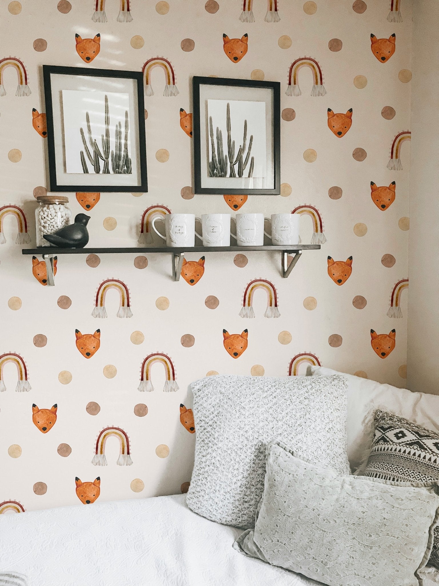 Playful animal pattern wallpaper styled in a living room with framed wall art.
