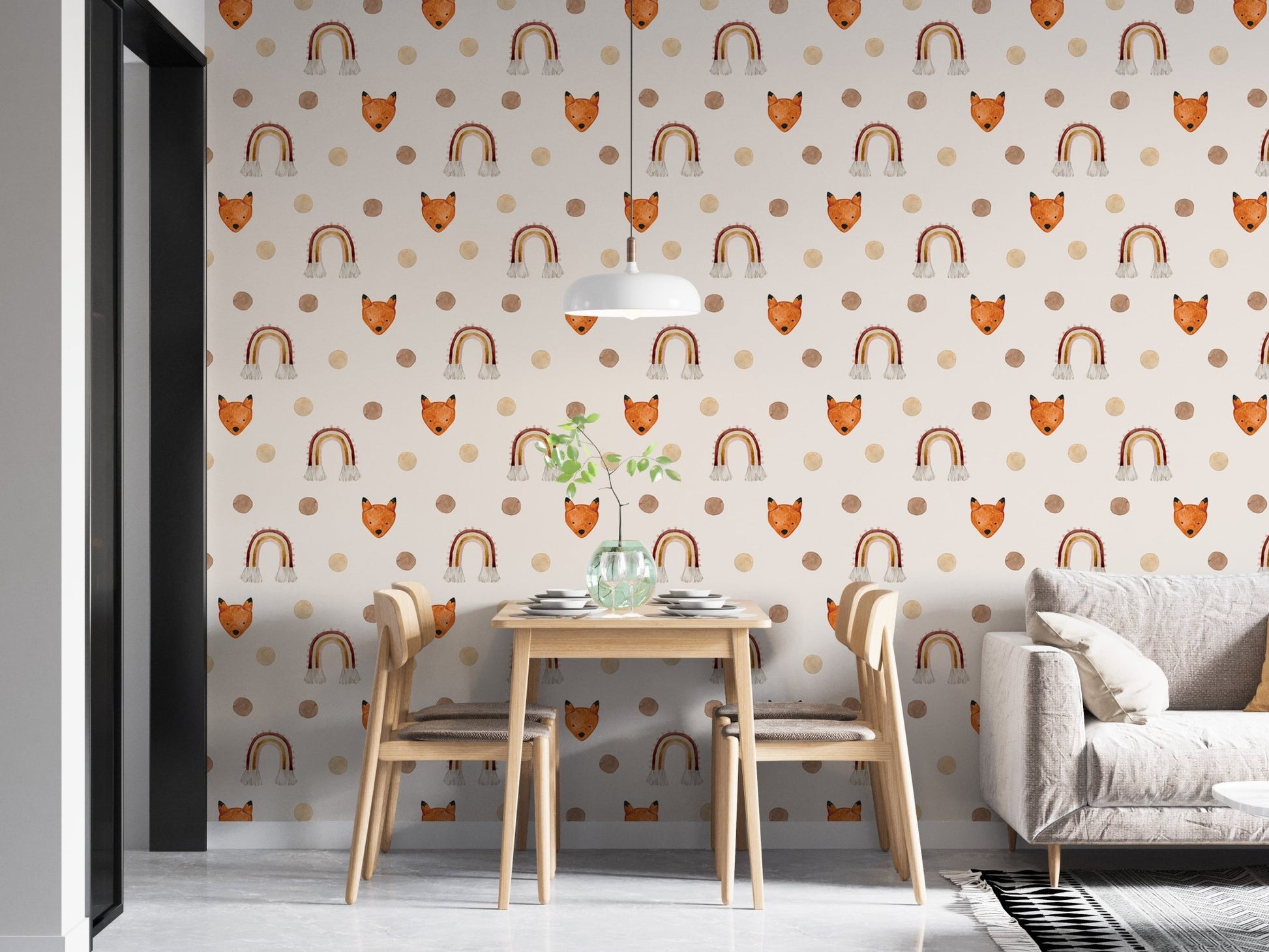 Modern dining space with polka dot fox wallpaper and grey furniture.
