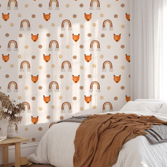 Fox and rainbow themed wallpaper in a modern bedroom with white linens.