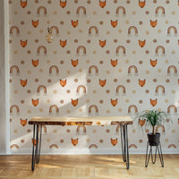 Earthy brown and beige fox wallpaper behind a wooden desk and plant