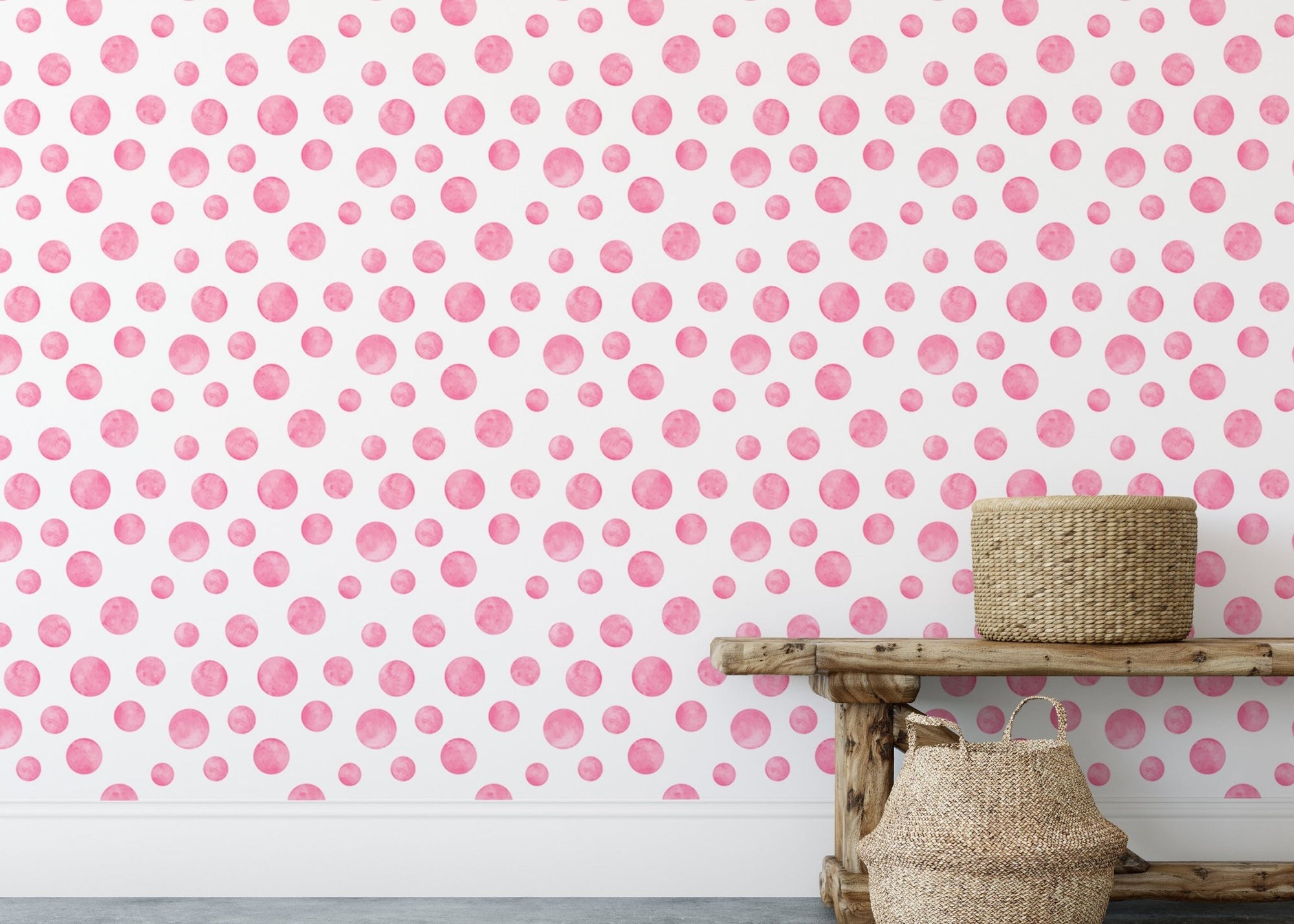 Polka Dots Pink Watercolor Abstract Circles Wallpaper behind a rustic wooden bench.