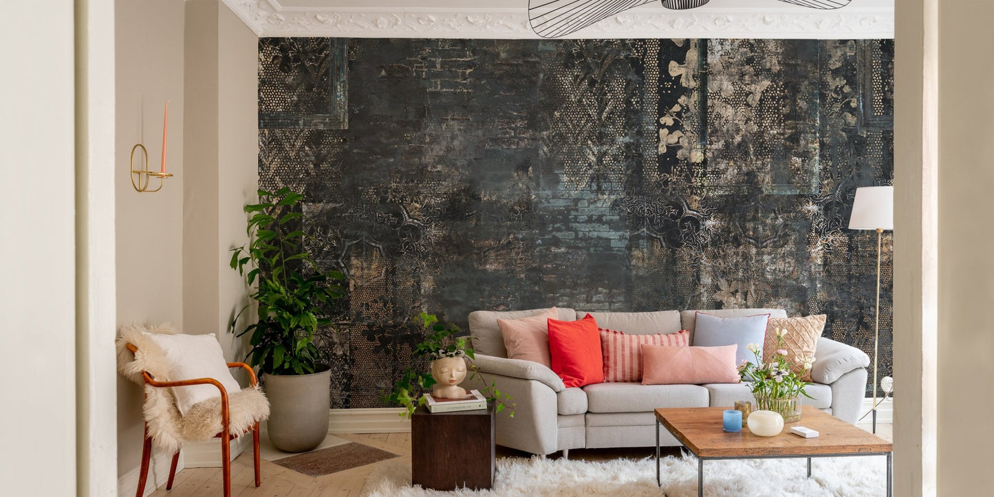 Contemporary sitting area with dark plaid wall mural and grey couch.