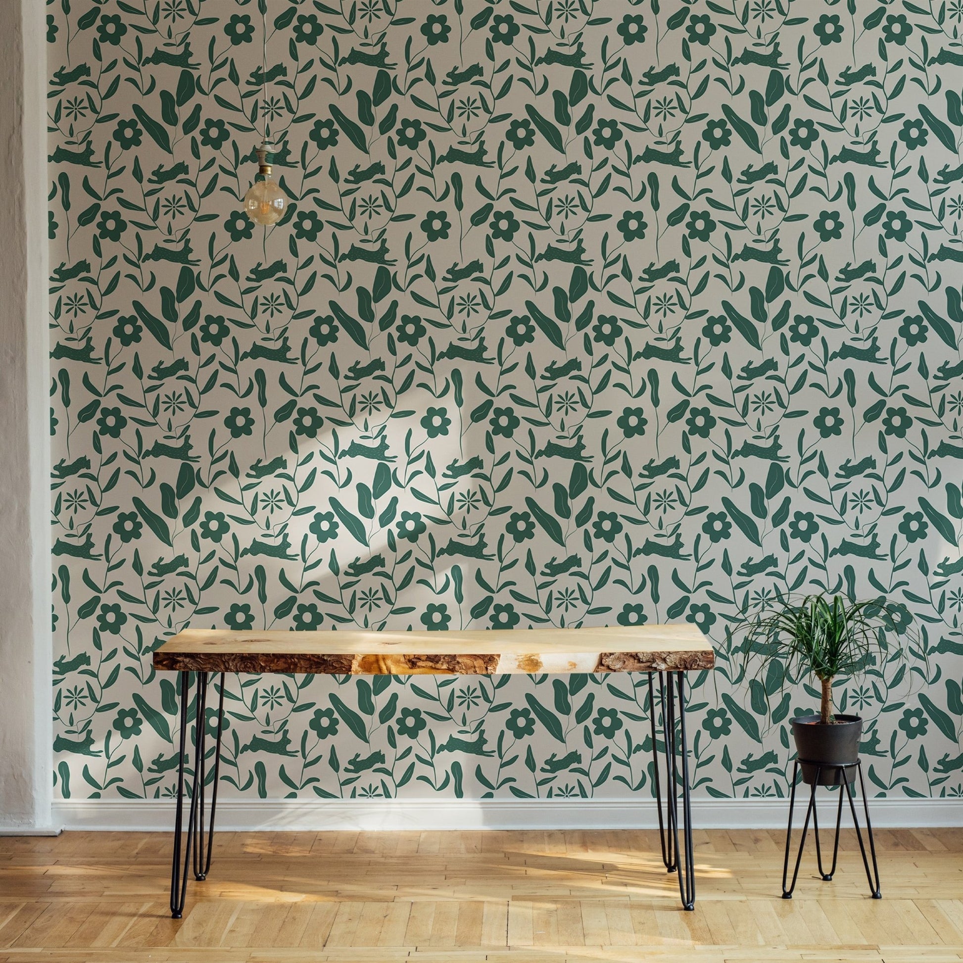 Scandi style wallpaper on a feature wall behind a dark wood desk.