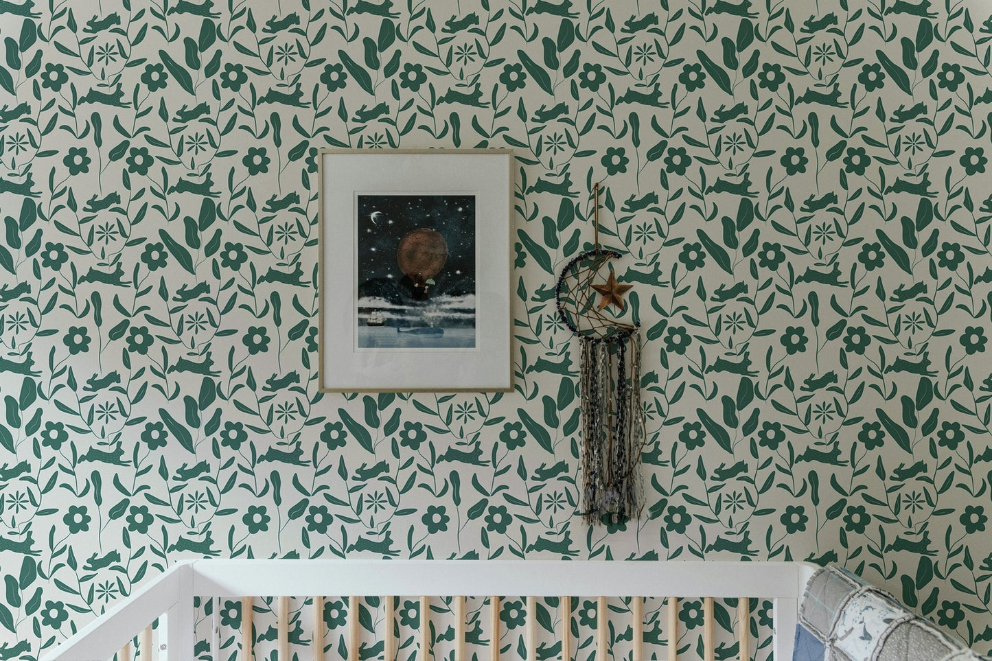 Rabbit Pattern Floral and Leaves Scandi Wallpaper in a nursery with a white crib.