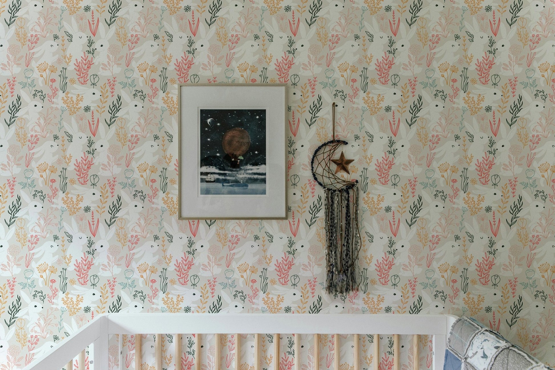 Rabbits Grass and Colorful Leaves Removable Wallpaper in baby room with white furniture.
