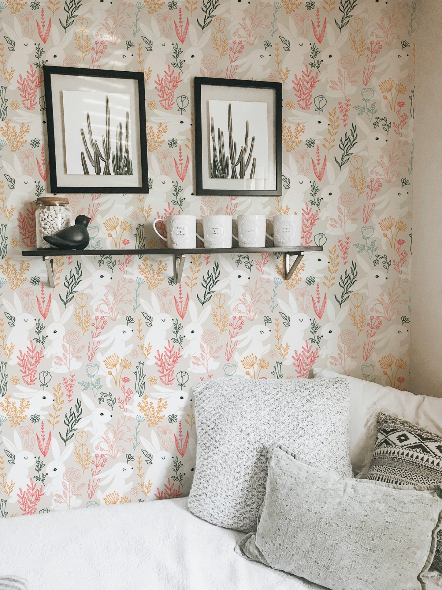 Rabbits Grass and Colorful Leaves Removable Wallpaper in bedroom with black frames.