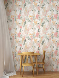 Dining room wall decor featuring neutral rabbit and colorful foliage wallpaper.