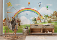Fun hot air balloon wall mural in a room with a wooden hanging swing chair.