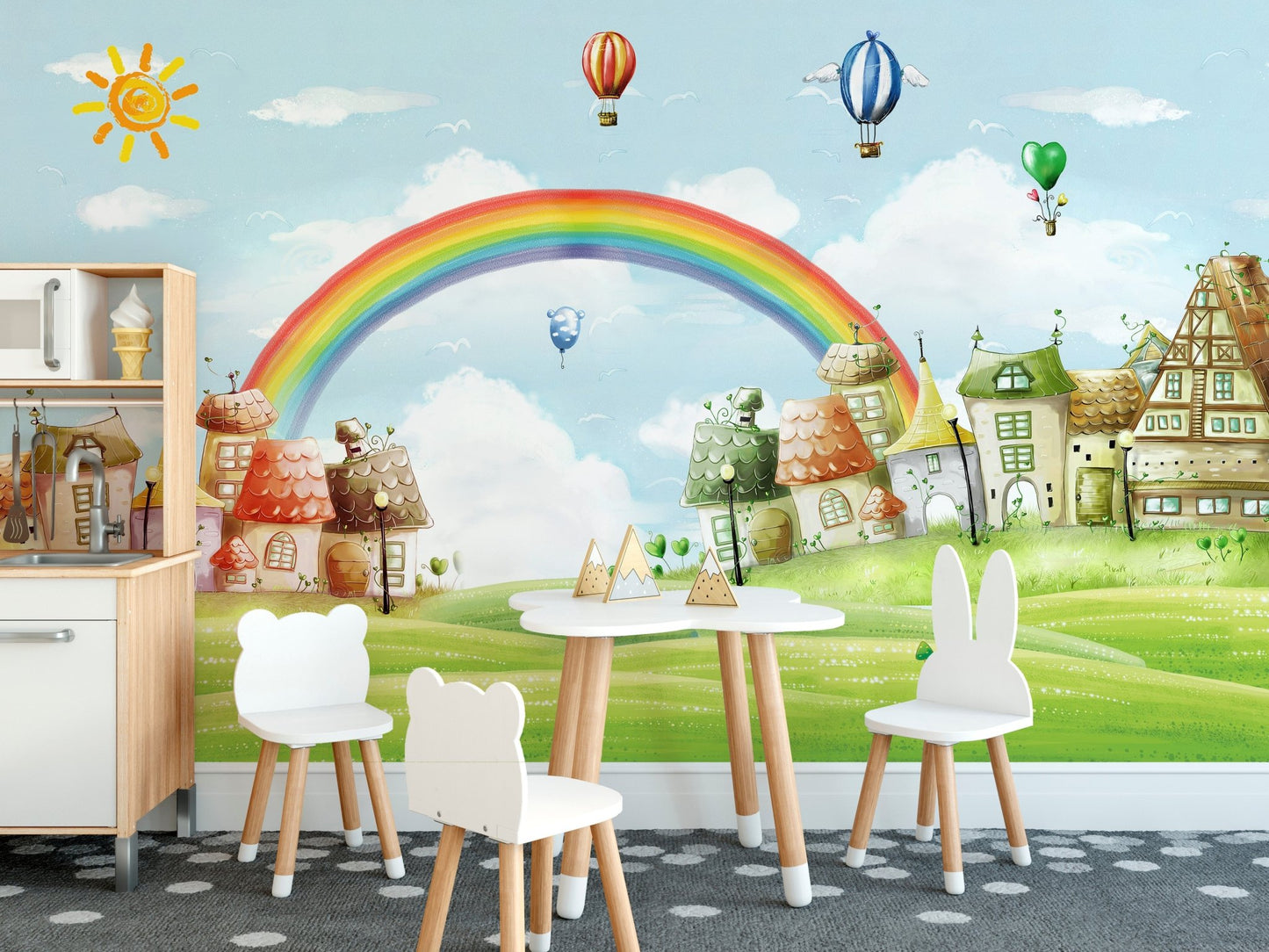 Cartoon city fantasy wall mural in a kids' dining area with small white chairs and table.