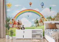Fantasy city wallpaper mural behind a white cabinet in a clean children's bedroom.