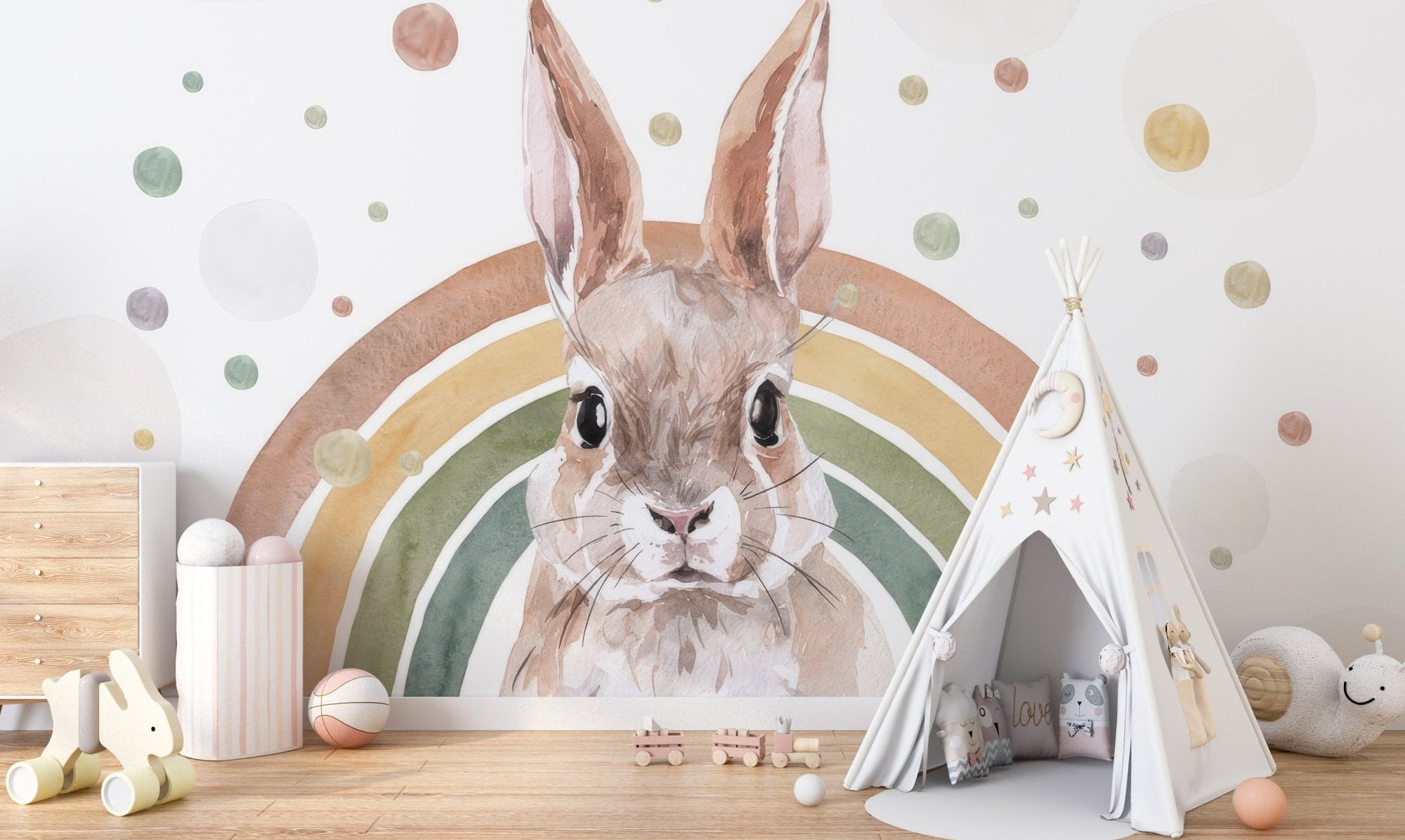 Rainbow rabbit wallpaper mural with watercolor bunny and soft arch.