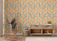 Nursery with rocking chair and colorful geometric vintage wall mural