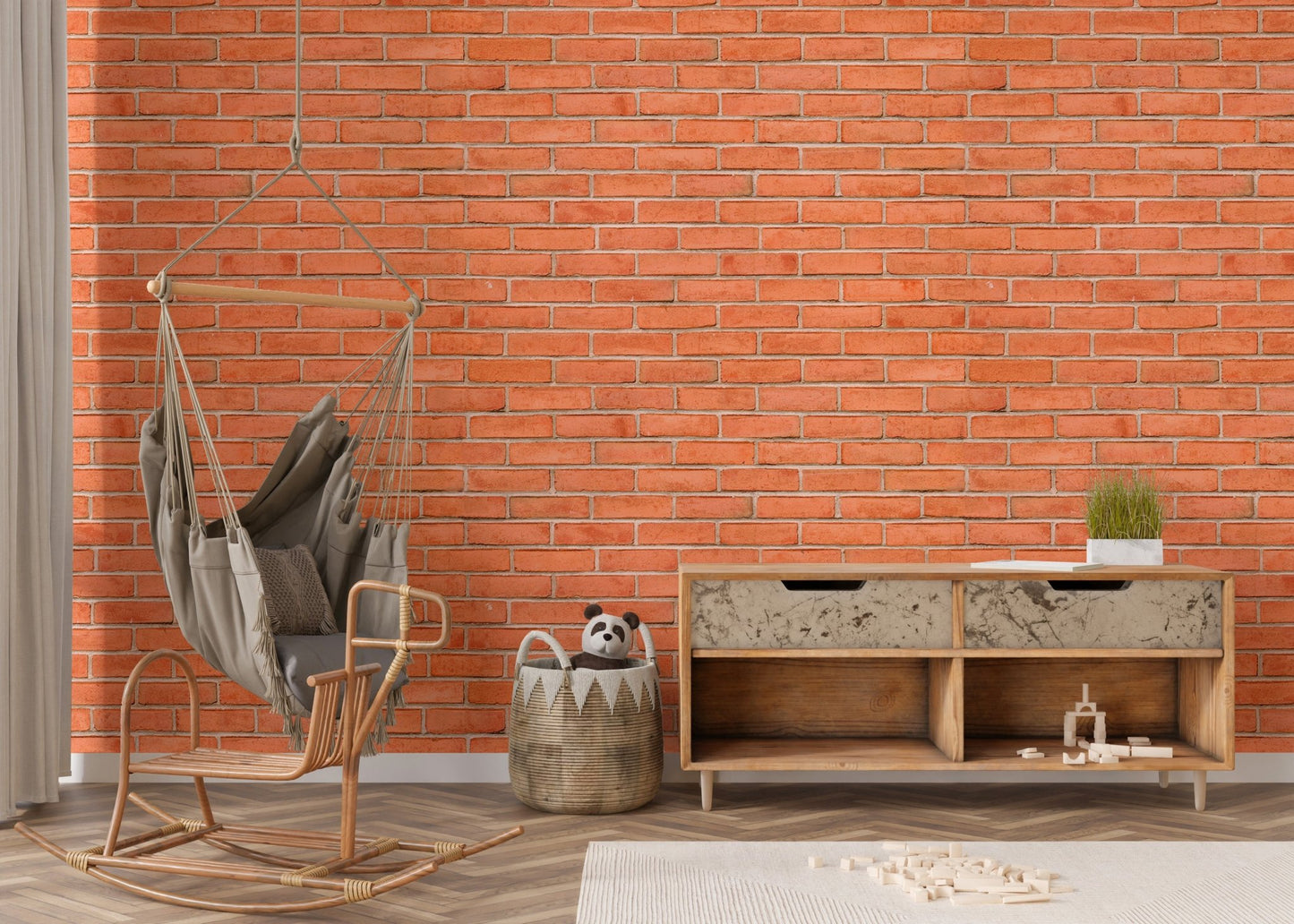 Red brick wallpaper in a living area with a rocking chair and wooden sideboard.