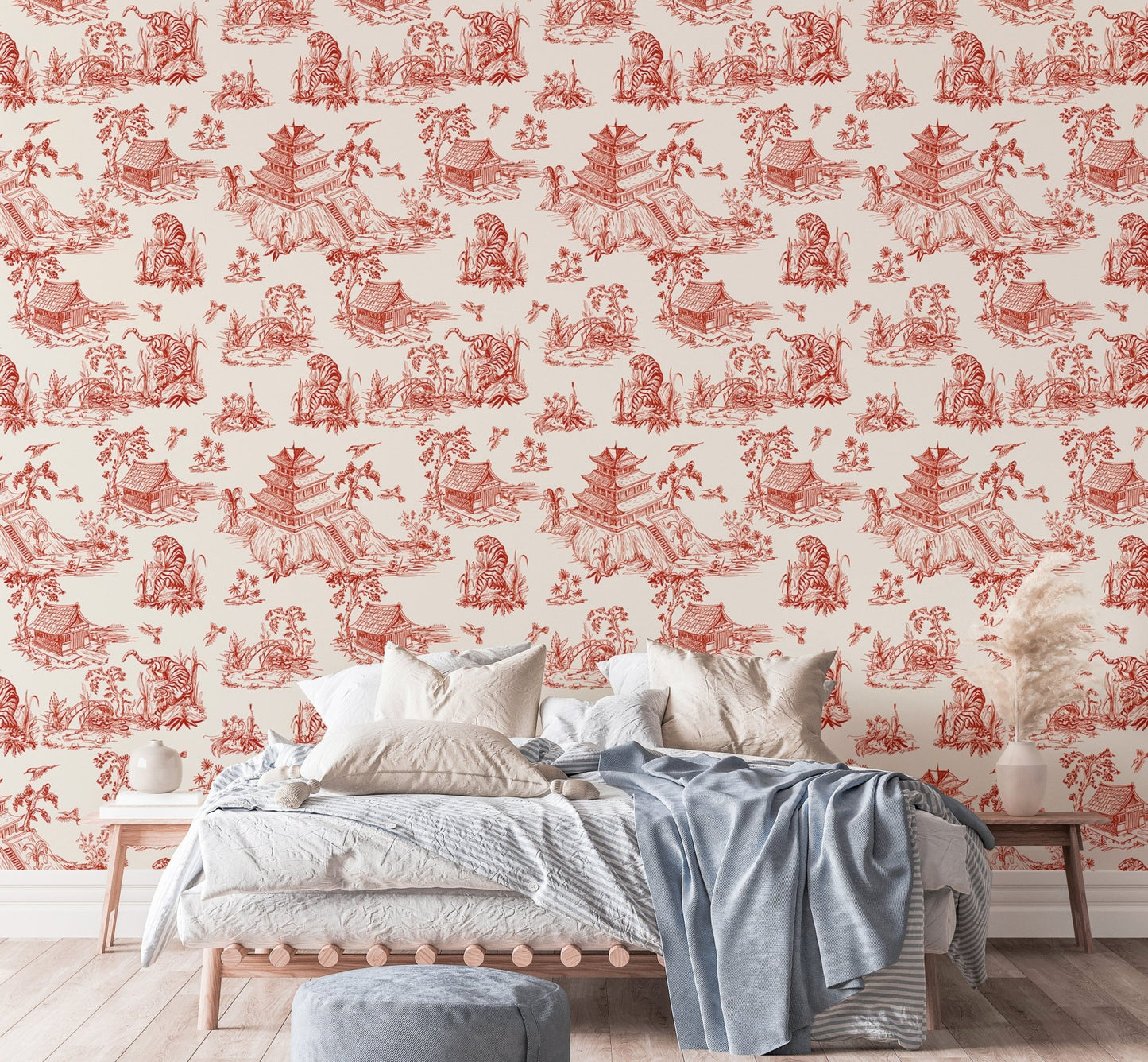 Red color seamless pattern chinoiserie style wallpaper in a bedroom with white bedding.