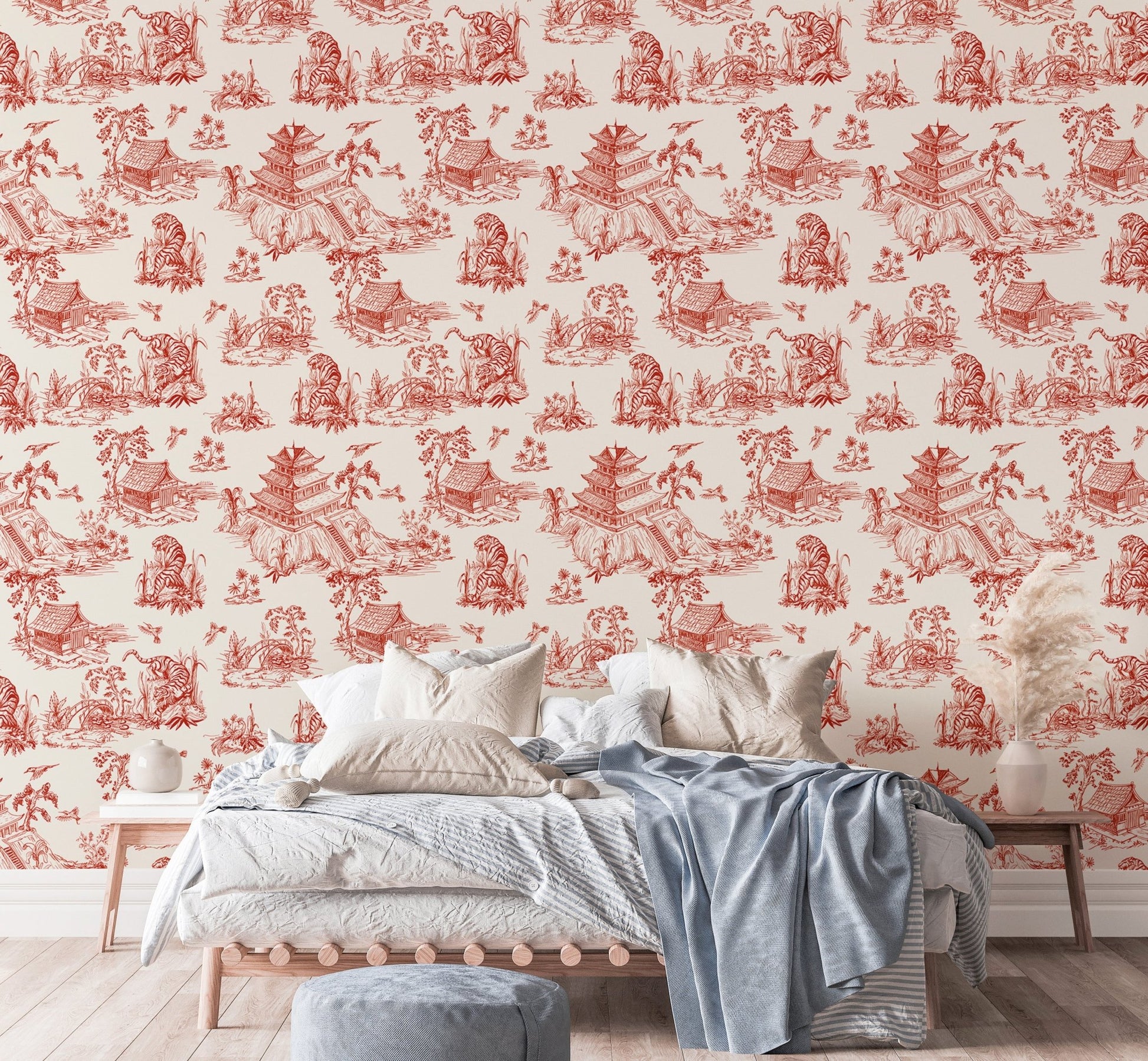 Red color seamless pattern chinoiserie style wallpaper in a bedroom with white bedding.