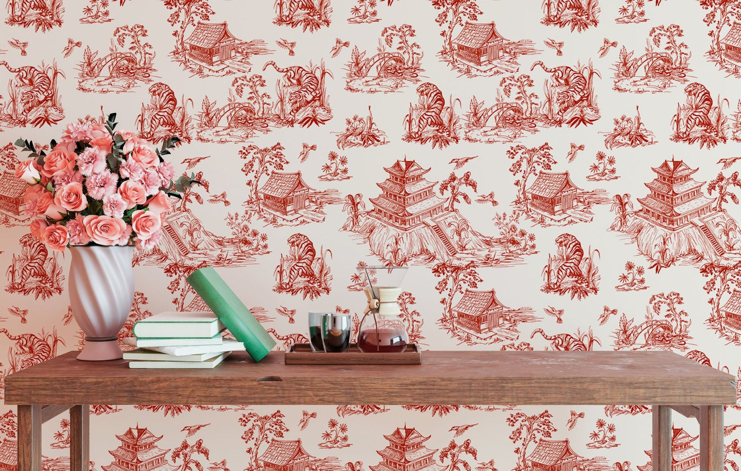 Small reading area featuring red landscape wallpaper and a wooden table.