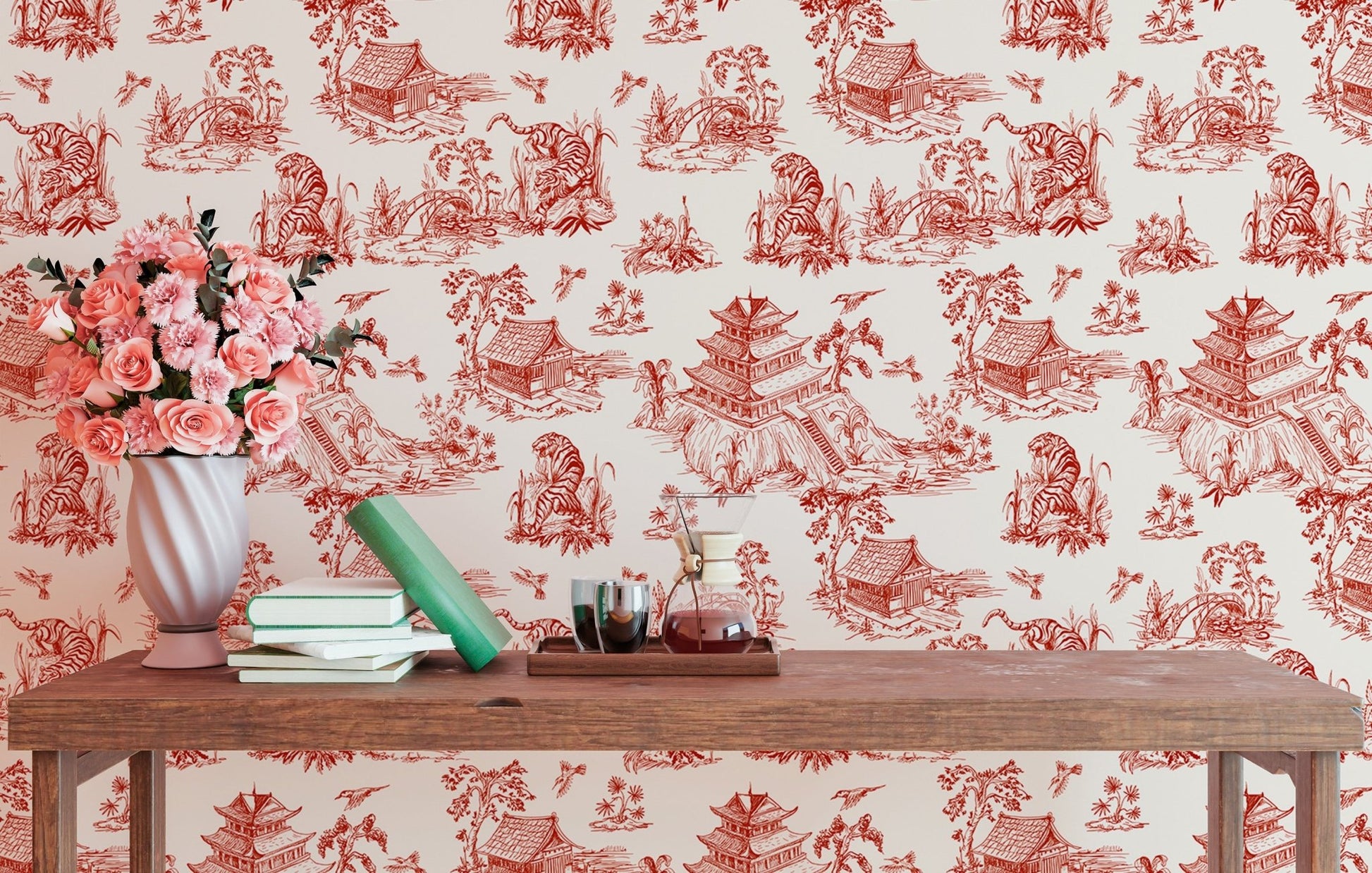 Small reading area featuring red landscape wallpaper and a wooden table.