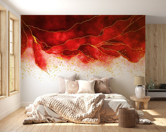 Neutral bed linens paired with a red and gold abstract wall mural.