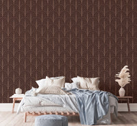 Chic art deco wallpaper in striking red wine hue for bedroom backdrop.