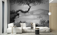 Low profile white sofa in front of a charcoal ink wash lakeview wall mural.