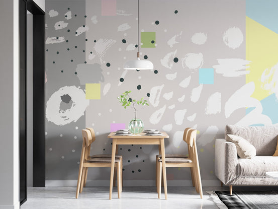 Abstract brushstroke wall mural in dining area with wooden table and chairs