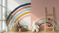 Large arch wall mural behind a white sofa and striped rug in a bright room.