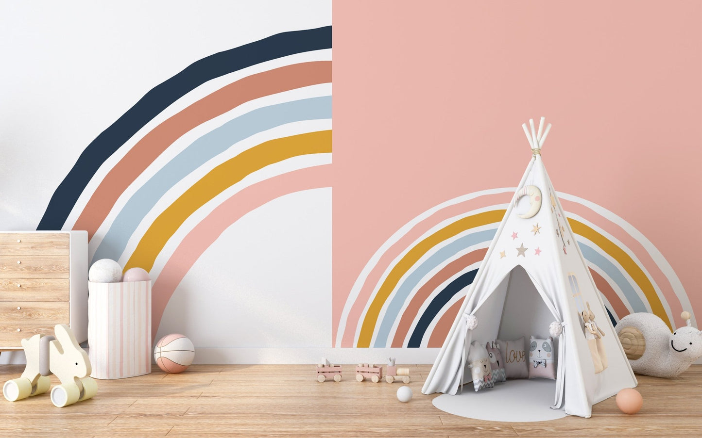 Play tent placed in front of a multicolor arched wall mural for children.
