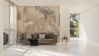 Open plan living area with subtle tropical leaf wallpaper mural features.