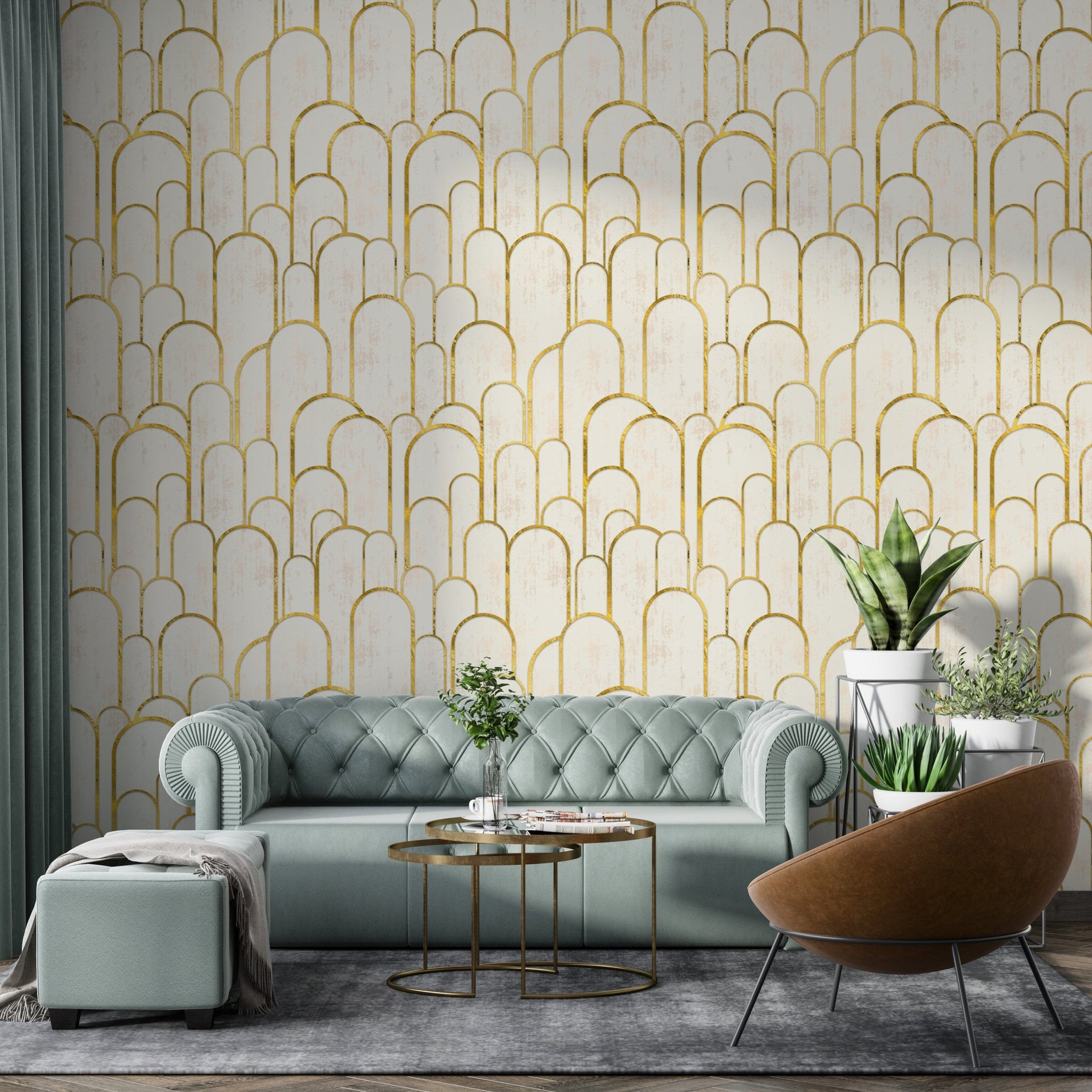 Mint green tufted sofa against gold archway wallpaper in living room.