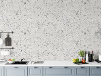 Repeat Pattern Terrazzo Designs White Texture Wallpaper in kitchen splashback area.